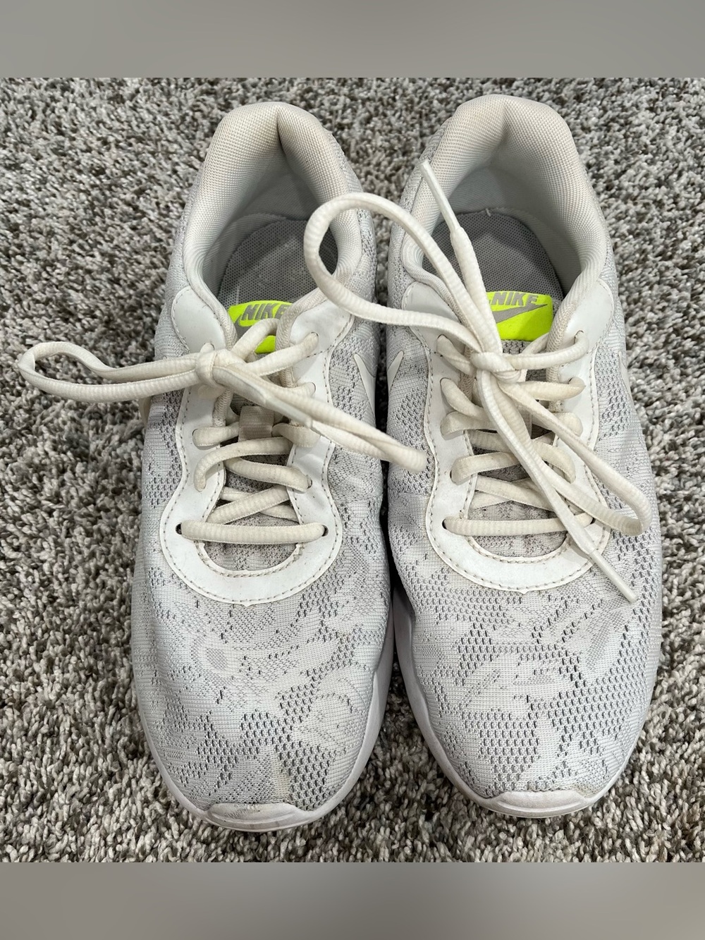 Nike women’s white lace sneaker with neon green